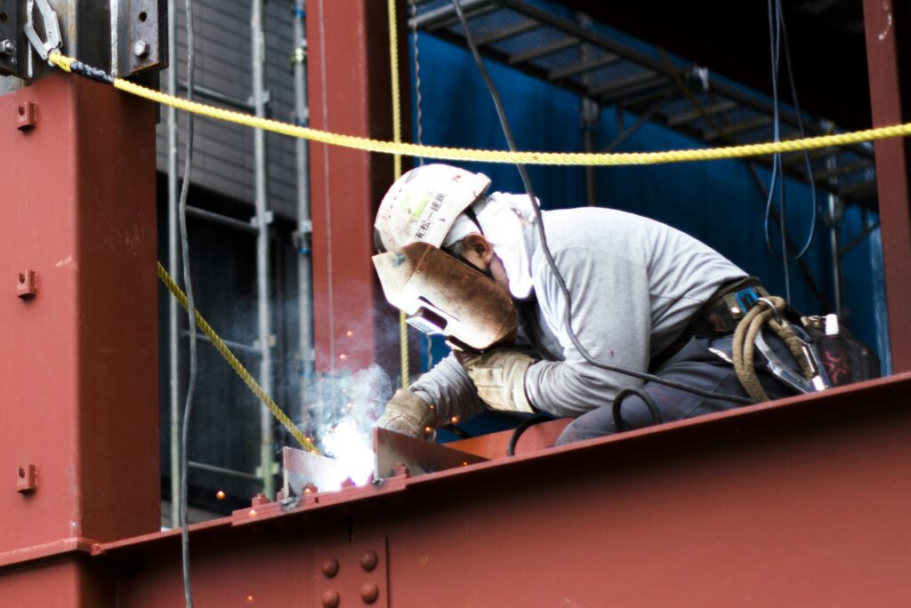 Man welding a metal structure